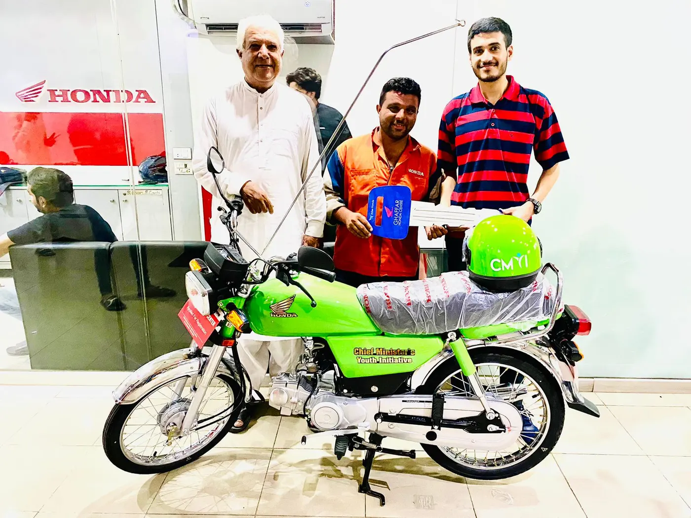 Young scheme applicants receiving their bikes - the program targets 18 to 35 year olds