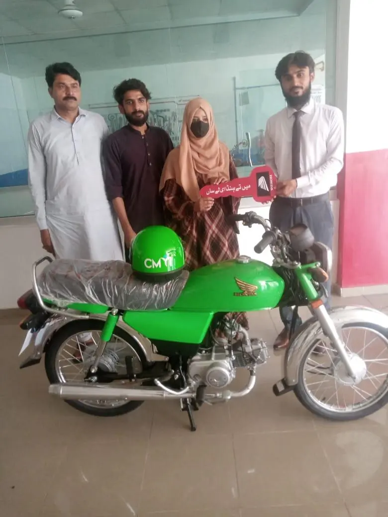 Scheme beneficiaries collecting their new bikes - delivery photo 8